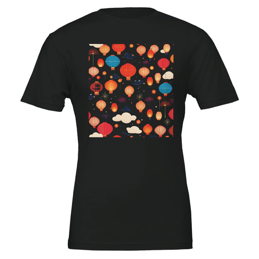 black t shirt with a design of lanterns lighting up the night sky. 